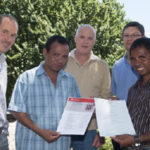 Visiting East Timorese scientists Joaquim Cabral and Abel Ximenes receiving training certificates from Drs Darryl Hardie and Vincent Lanoiselet (Department of Agriculture and Food) and Dr Aaron Maxwell (Commonwealth Department of Agriculture Fisheries and Forestry)