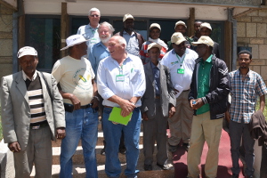 Eric Craswell (back left) and John Dixon (centre left) with John Ferrier and SIMLESA partners