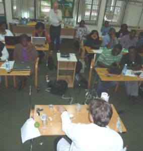 Crawford Fund trainer demonstrating laboratory technique to isolate fungi
