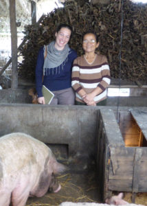 Tarnie Cooper revisiting a pig farmer in Hue, Vietnam